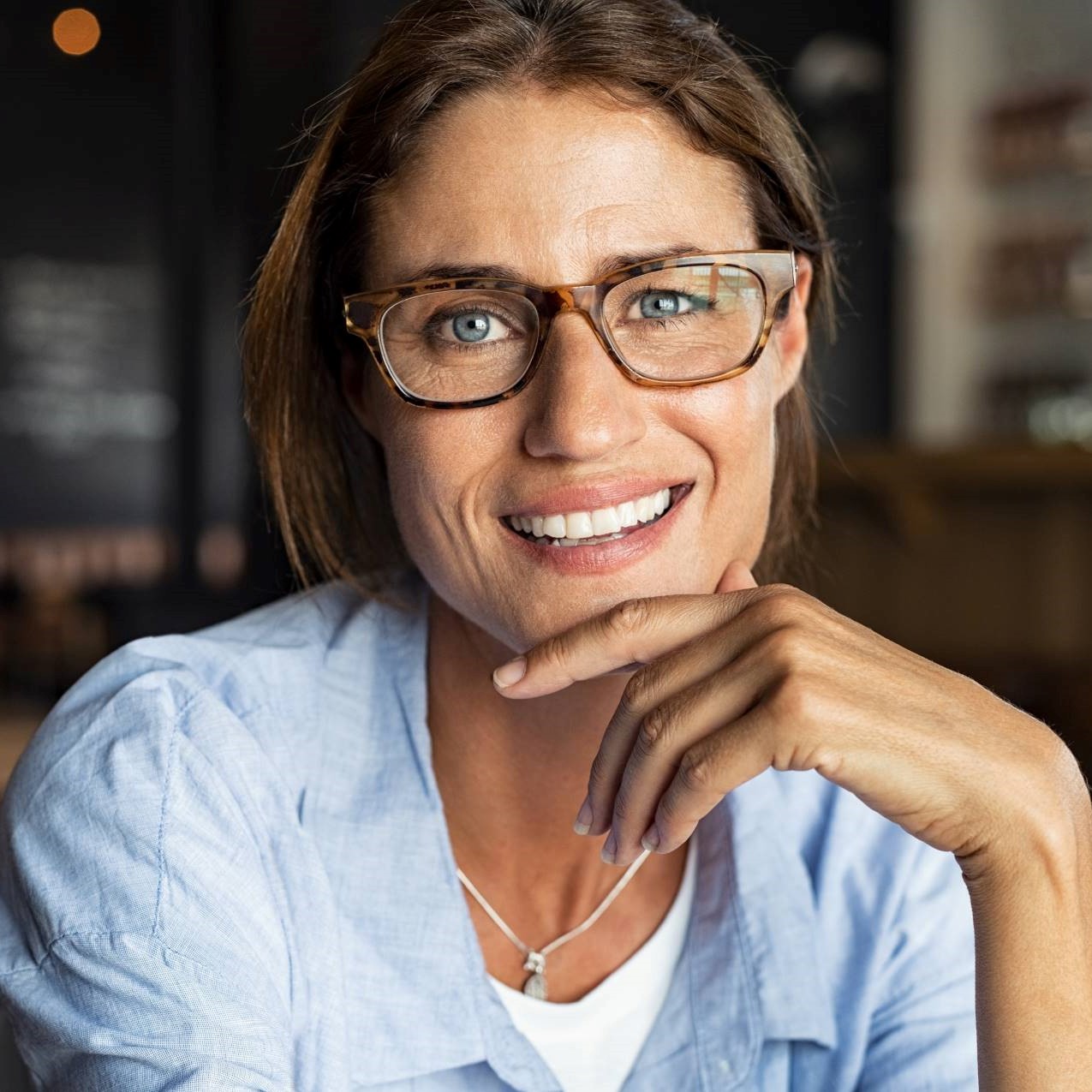 Canva-Happy-Mature-Woman-Wearing-Eyeglasses-1920s.jpg